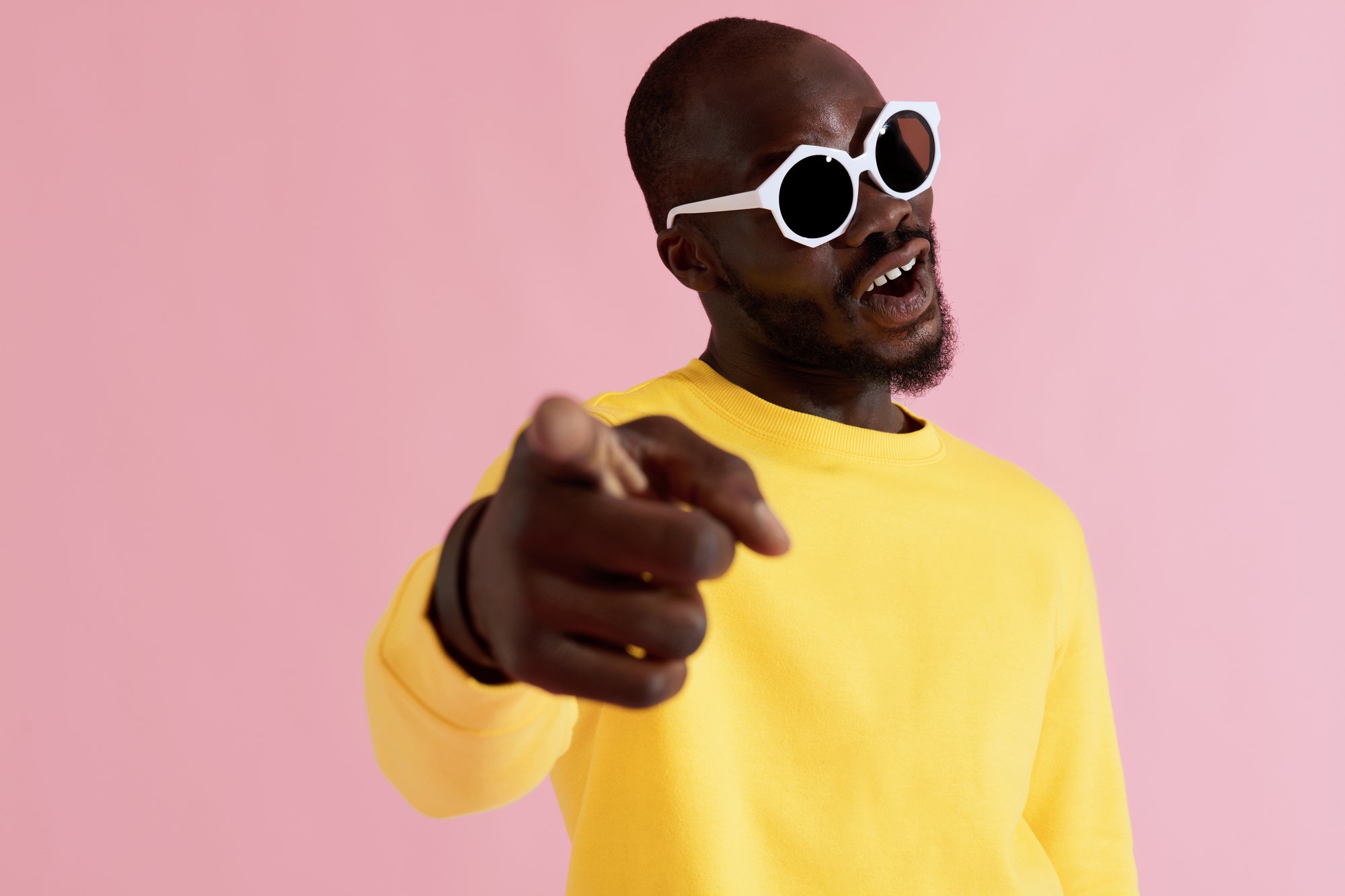 Fashion Happy black man in sunglasses and sweatshirt portrait