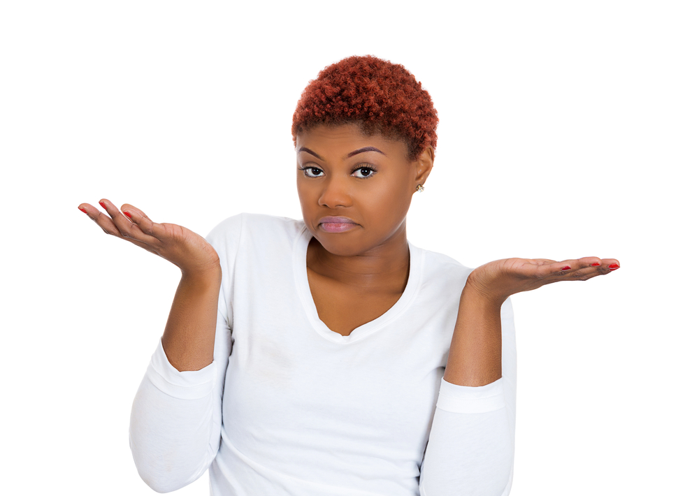 Closeup portrait of pretty angry unhappy young woman with arms out asking whats the problem who cares so what I dont know, isolated on white background. Negative human emotions, facial expressions