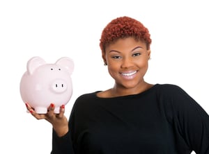 Closeup portrait of young woman holding her piggy bank friend in hand, isolate on white background. Positive emotion facial expression feelings. Smart wise saving paid financial decisions. Nest egg-1