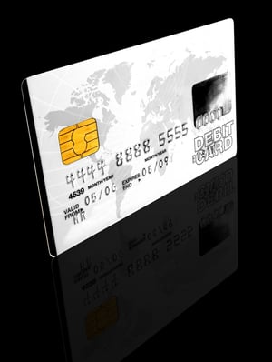 credit card over a black background - note the design of the card is my own and the numbers on the card are made up